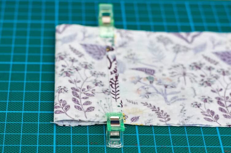 Detail image of clipped fabric on top of green cutting mat