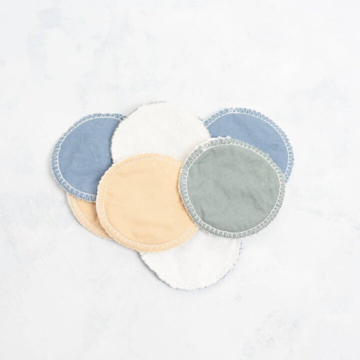 flatlay eight facial rounds on a white background